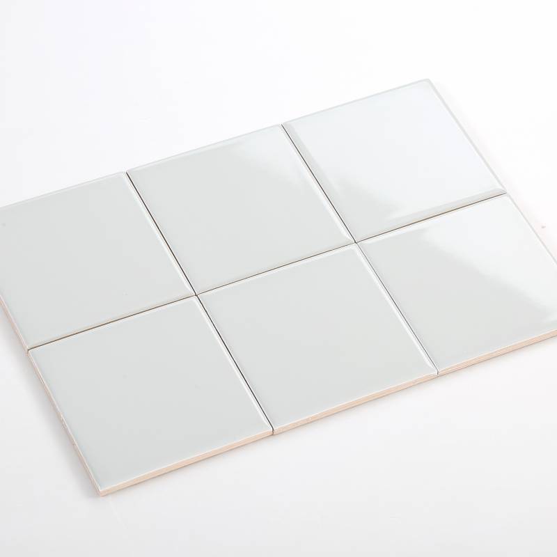 Gạch thẻ 100x100 bóng phẳng màu xám nhạt nhập khẩu