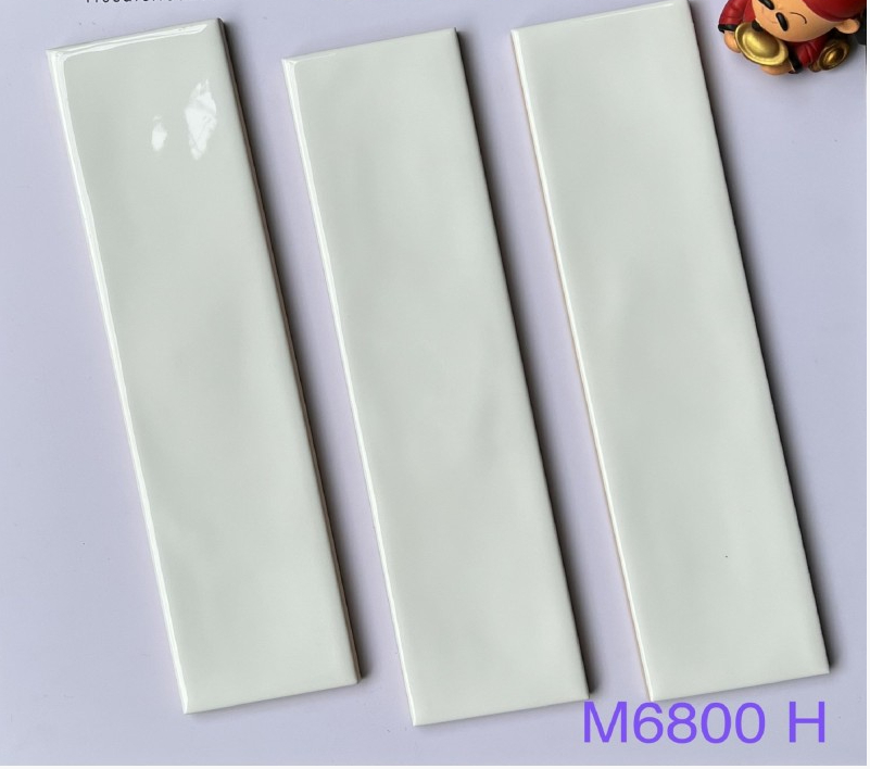 Gạch thẻ 68x280mm lượn mặt trắng bóng